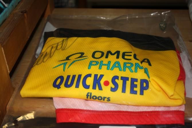 A signed Boonen jersey sits ready to be shipped out