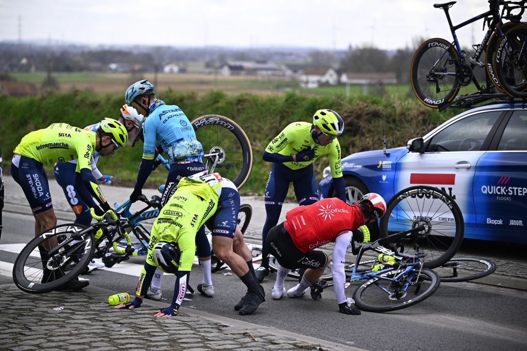 Cyclists pictured during a fall during the Kuurne-Brussels-Kuurne one day cycling race, 196,4 km from Kuurne to Kuurne via Brussels, Sunday 25 February 2024.
BELGA PHOTO JASPER JACOBS (Photo by JASPER JACOBS / BELGA MAG / Belga via AFP)