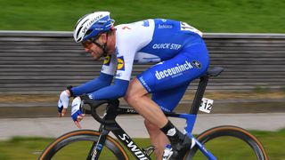  Kasper Asgreen of Denmark and Team Deceuninck-Quickstep races along during the Kuurne-Brussel-Kuurne cycling event