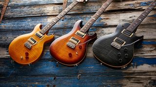 A group of PRS SE electric guitars, including (L-R) a Santana, Custom 24 and a Tremonti, taken on October 4, 2016