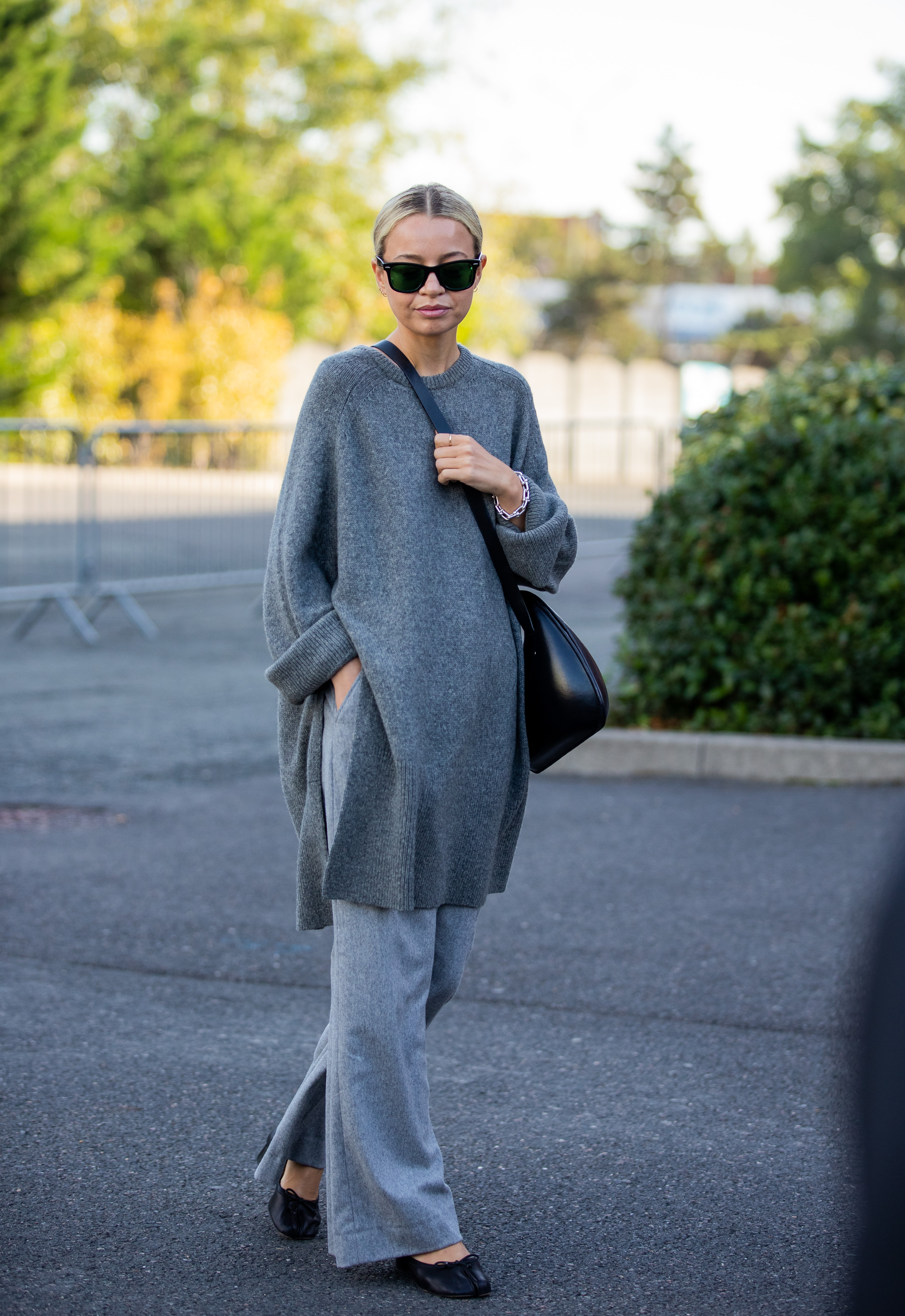 woman wearing sweater and pants