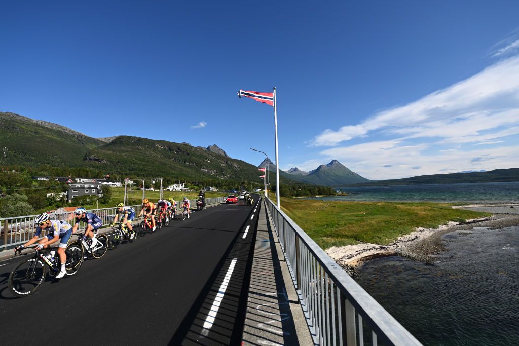 HARSTAD NORWAY AUGUST 08 Erik Nordsaeter Resell of Norway and UNO X Pro Cycling Team Aim De Gendt of Belgium and Team Intermarch Wanty Gobert Matriaux Niki Terpstra of Netherlands and Team Total Direct Energie Thomas Champion of France and Team Cofidis Philipp Walsleben of Germany and Team AlpecinFenix Ceriel Desal of Belgium and Team Bingoal WB Michael Grosu Eduard of Romania and Team DELKO Andre Aase Vab Tore of Norway and Team Team COOP in the Breakaway during the 8th Arctic Race Of Norway 2021 Stage 4 a 1635km stage from Gratangen to Harstad 54m ArcticRace on August 08 2021 in Harstad Norway Photo by Stuart FranklinGetty Images