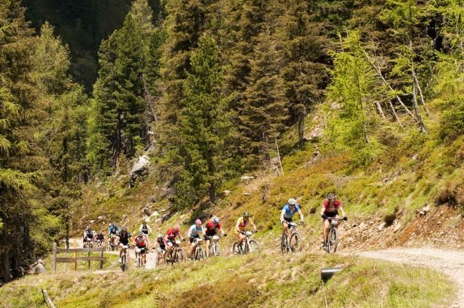 A long line of riders on the climb during stage 4 of the Bike Four Peaks