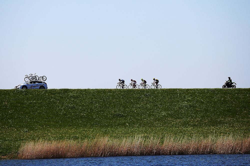 The breakaway rides along a dike in the Netherlands during the Giro's third stage.