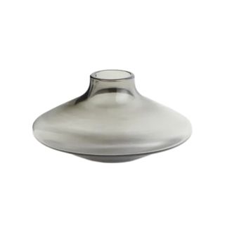 A round glass gray vase