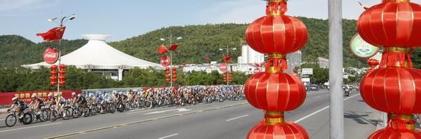 The peloton passes over the first stage in China.