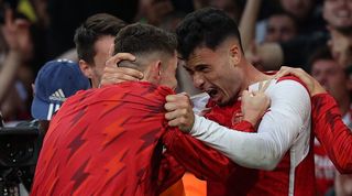 Gabriel Martinelli celebrates with Arsenal team-mates after scoring a late winner against Manchester City in the Premier League in October 2023.