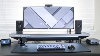 The Hexcal Studio incorporated into a desk setup under a monitor