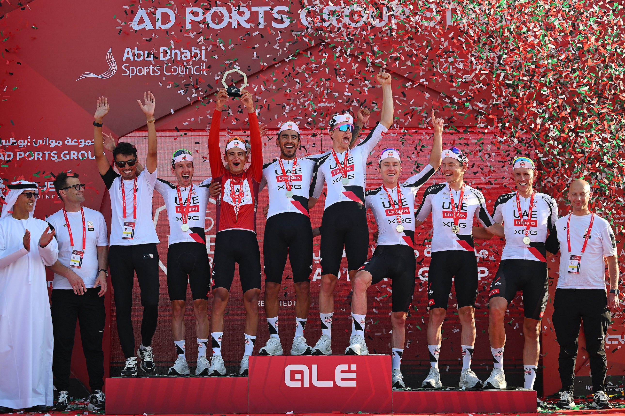 XRG celebrate at podium as best team during the 8th UAE Tour 2026, Stage 7 