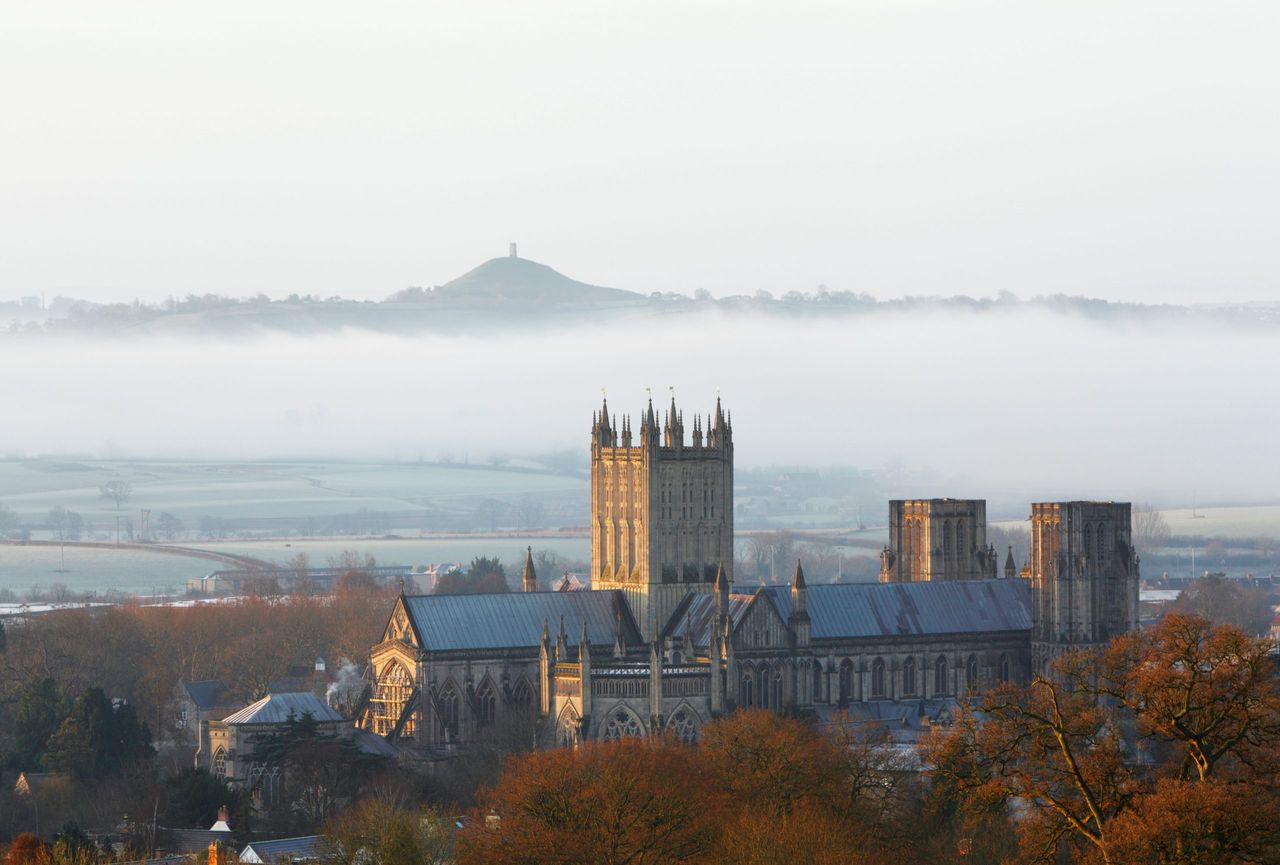 Wells Cathedral with Glastonbury Tor in the distance.