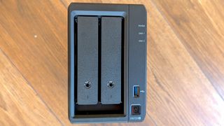 Synology DiskStation 723+ on a wooden floor