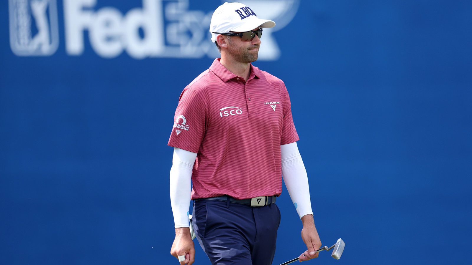 Ben Silverman walks off the green