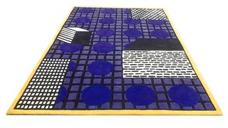 Blue and yellow geometric Tapigri rug
