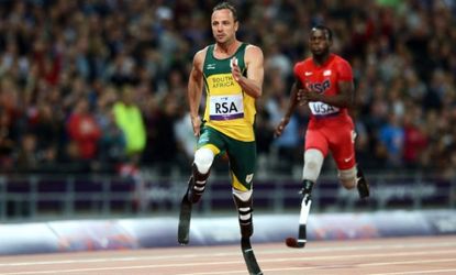 Oscar Pistorius of South Africa finishes with gold in the Men's 4x100m relay T42/T46 Final at the London 2012 Paralympic Games.