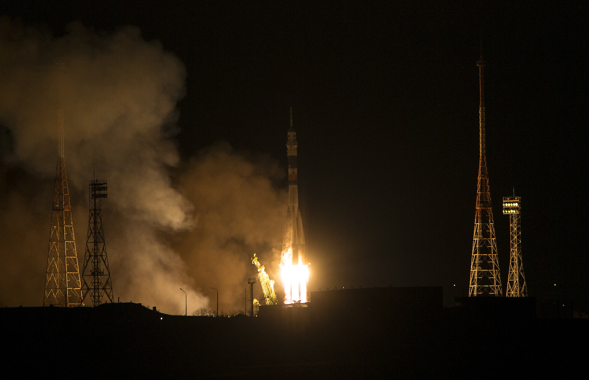 A Russian Soyuz rocket and TMA-15M spacecraft blast off from Baikonur Cosmodrome, Kazakhstan on a mission to ferry a new crew to the International Space Station on Nov. 23, 2014. Riding the rocket into orbit were NASA astronaut Terry Virts, European Space