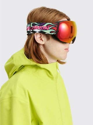 Man in coloured ski goggles with flame straps