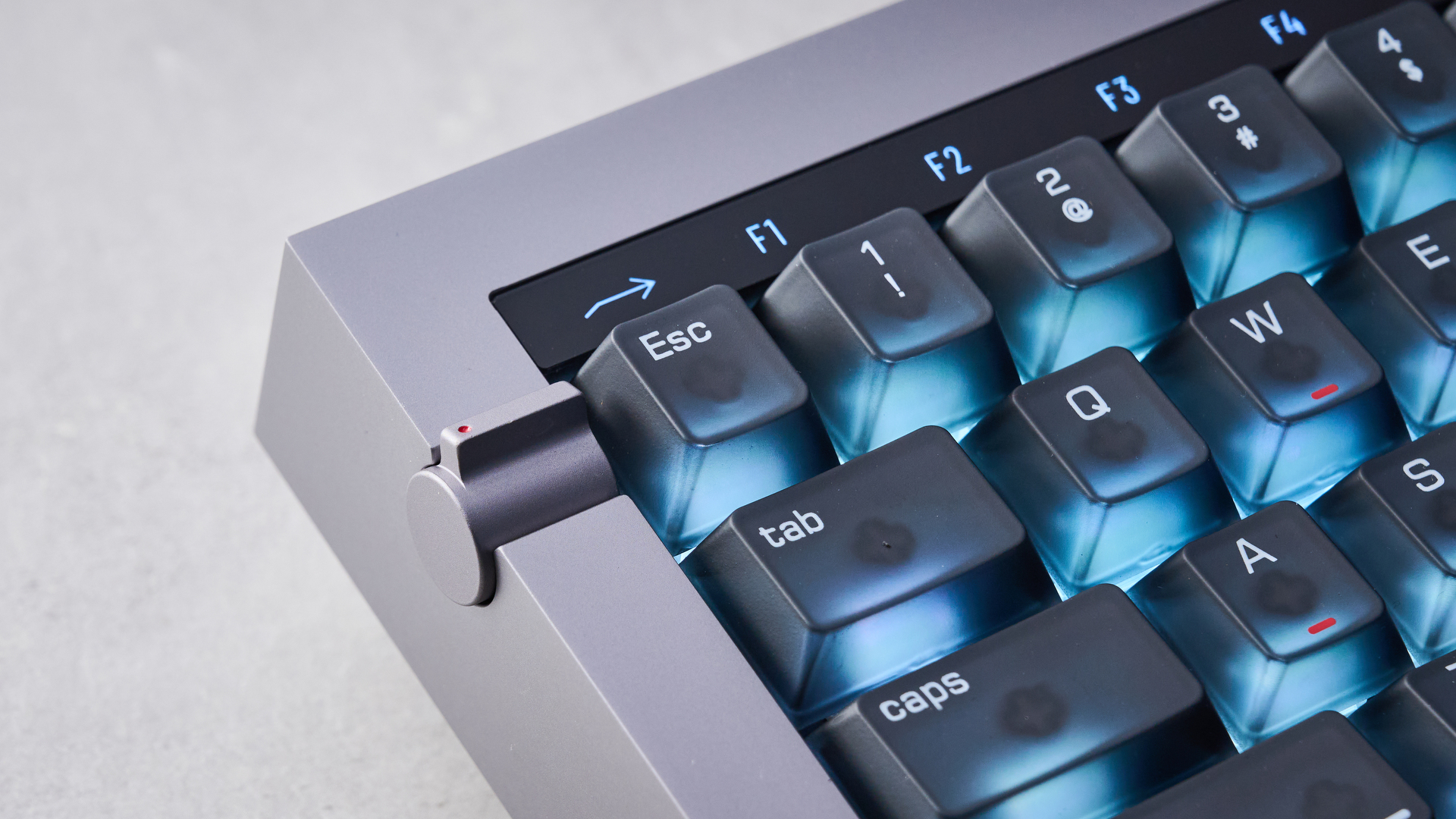 The Lofree Hyzen keyboard on a stone surface