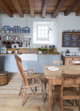 Old pine table in a rustic kitchen