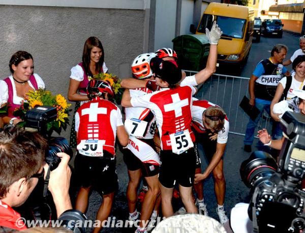 Ralph Naef (Switzerland) is congratulated by the Swiss team