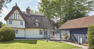cottage extension ideas - cottage extensions glazed link joining thatched cottage to outbuilding