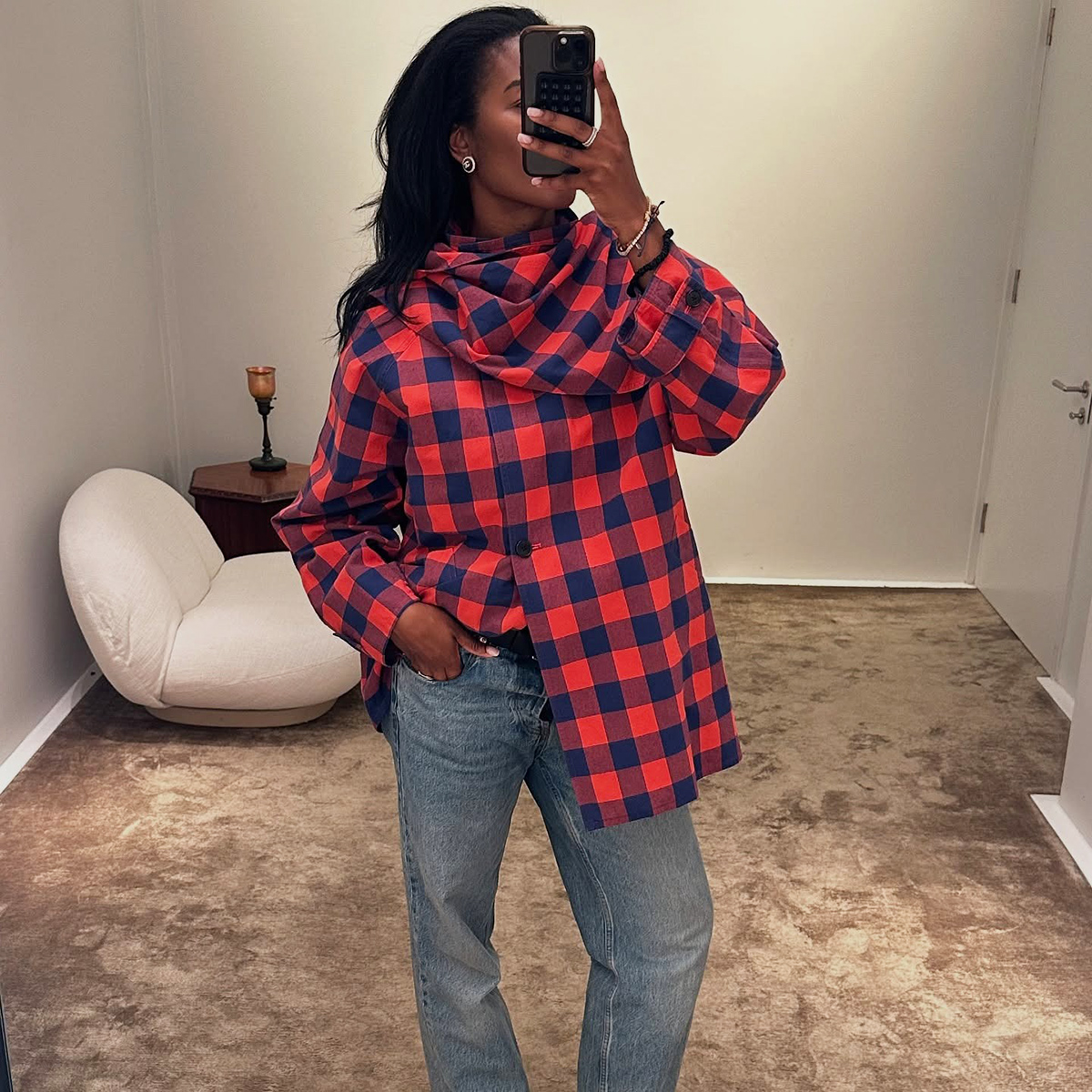 Influencer wearing The Row plaid shirt and jeans