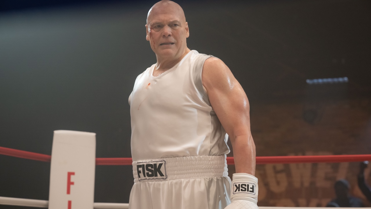 Vincent D'Onofrio's Kingpin wearing boxing gloves and attire inside of a boxing ring in Daredevil: Born Again