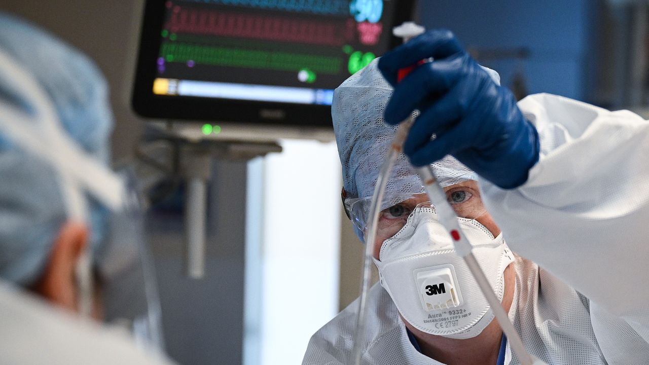 Doctor monitors patient