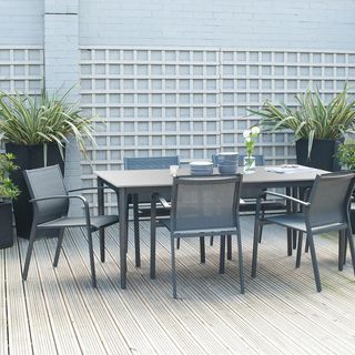 modern dining set on a decked terrace