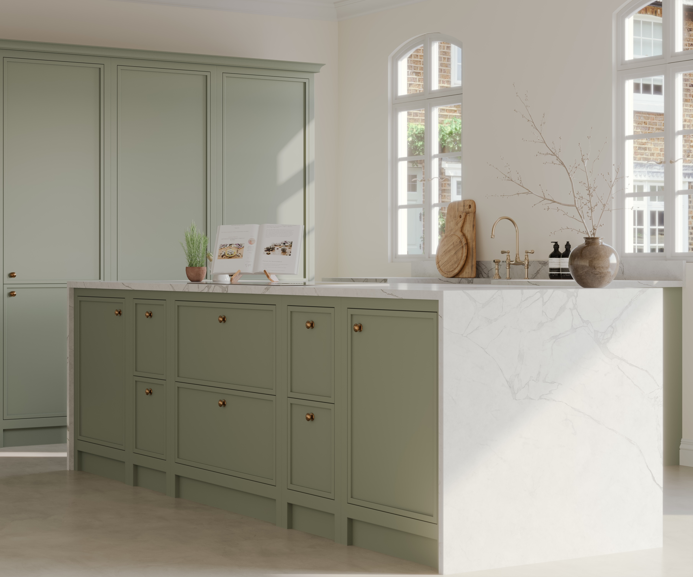 kitchen with sage green cabinets and white waterfall worktop
