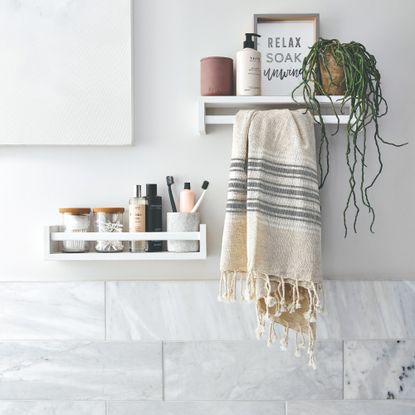 16 tips for decluttering a bathroom from professional organisers