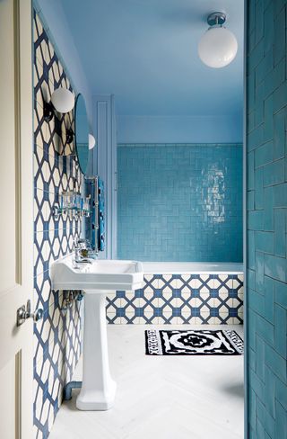 Blue and white tiled bathroom