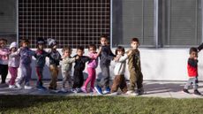 Head Start students walk to a classroom at an elementary school in Los Angeles.