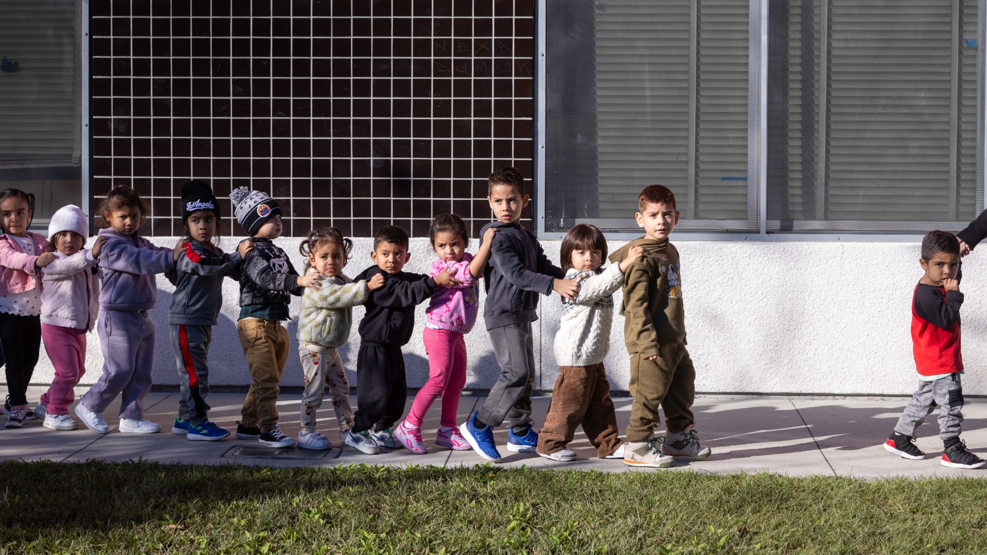 Head Start students walk to a classroom at an elementary school in Los Angeles.