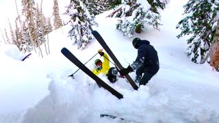 snowboarders rescue skier trapped in snow