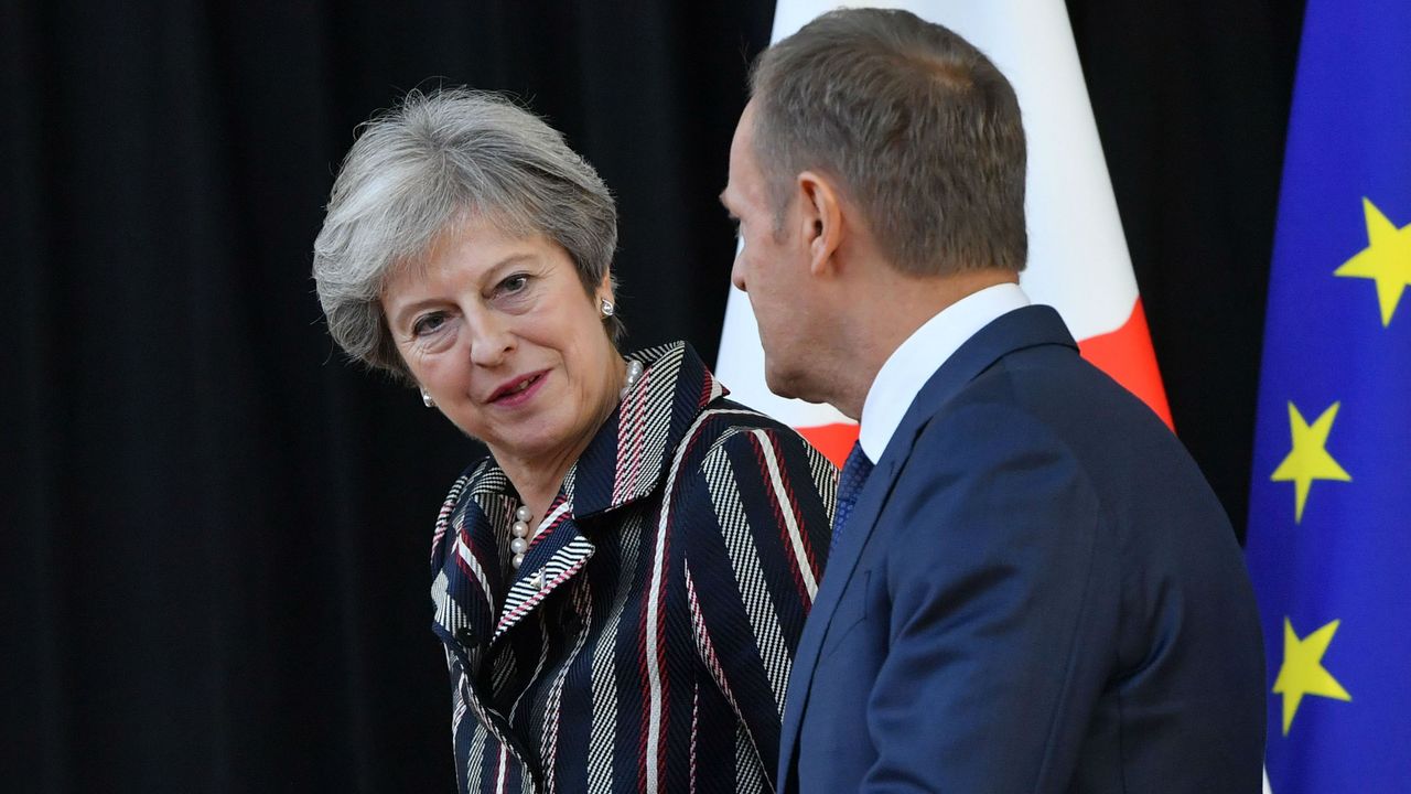 Theresa May talks to European Council President Donald Tusk in Brussels 