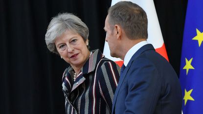 Theresa May talks to European Council President Donald Tusk in Brussels 
