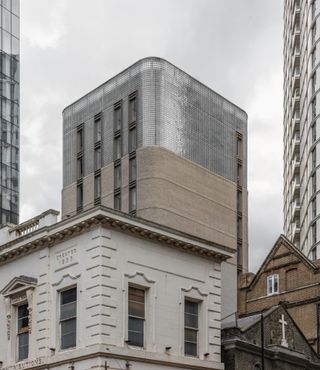 the Buckle street studios tower in London with gleaming glass brick top