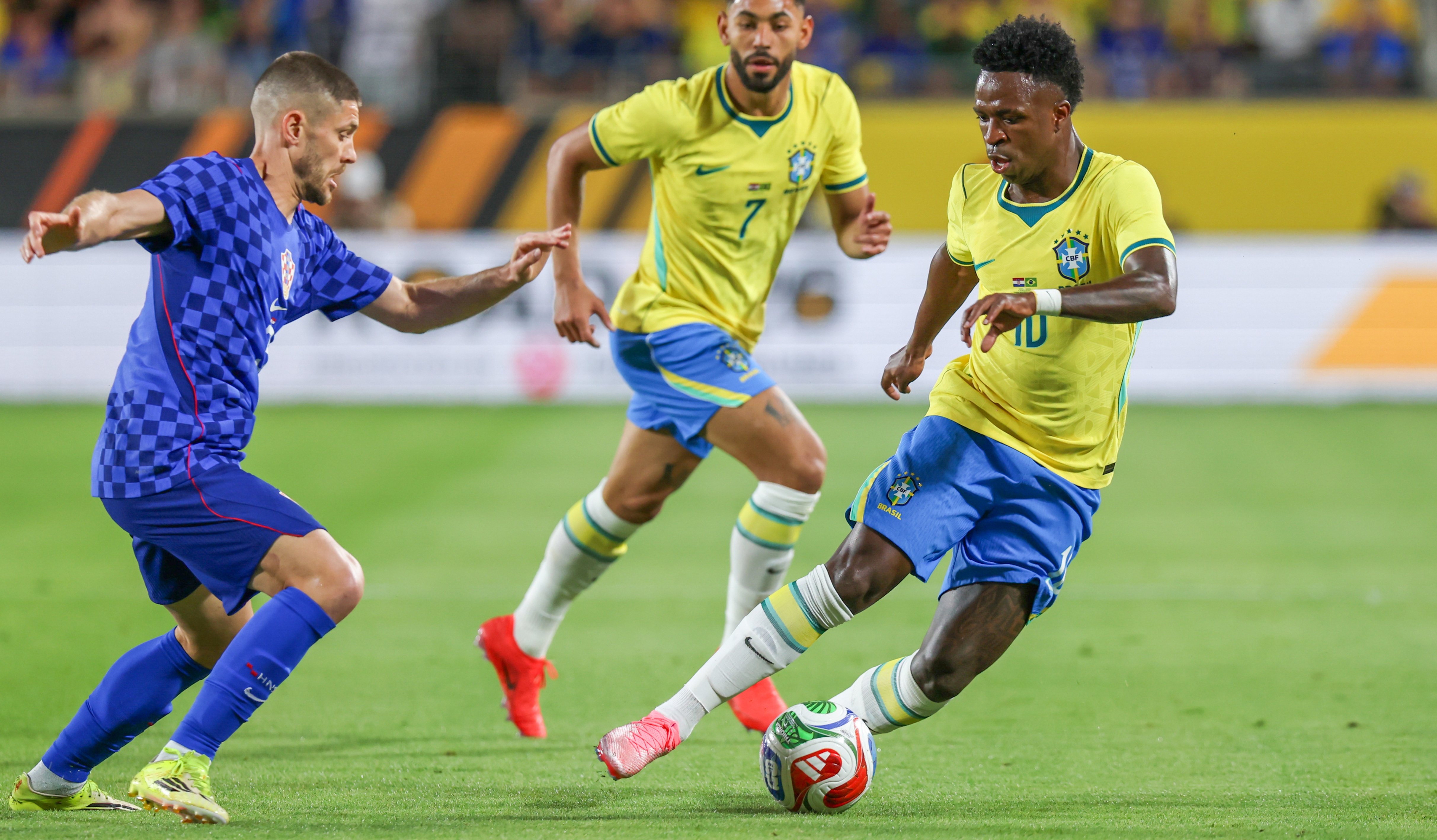 Vinicius Junior of Brazil dribbles the ball during a match against Croatia at Camping World Stadium on March 31, 2026 in Orlando, Florida