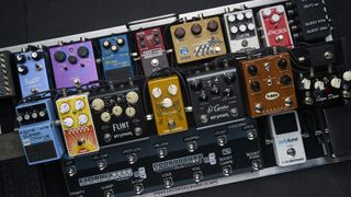 Fully loaded pedalboard which includes Boss CH-1 chorus pedal