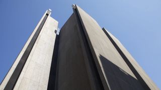 The seemingly monolithic façade of the Buffalo City Court Building is as good as bereft of windows