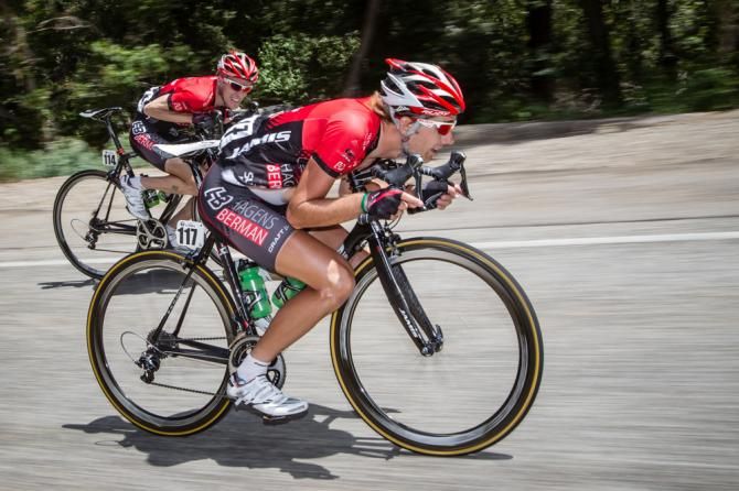 Jamey Driscoll (Jamis-Hagens Berman) and teammate Tyler Wren pushing 60 mph coming off the KOM