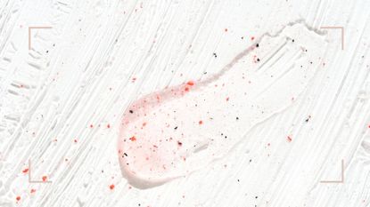 Salicylic acid gel swatch on a pink spotty background 