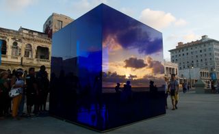 Ten-foot cube made of blue stained glass '