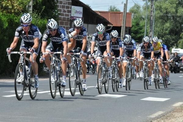 Saxo Bank, the team of race leader Gustav Larsson, sets tempo at the front of the peloton.