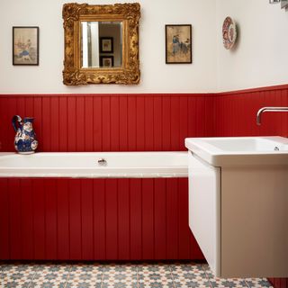 how to panel a wall, bathroom with red panelling, tiled floor, wall mounted sink