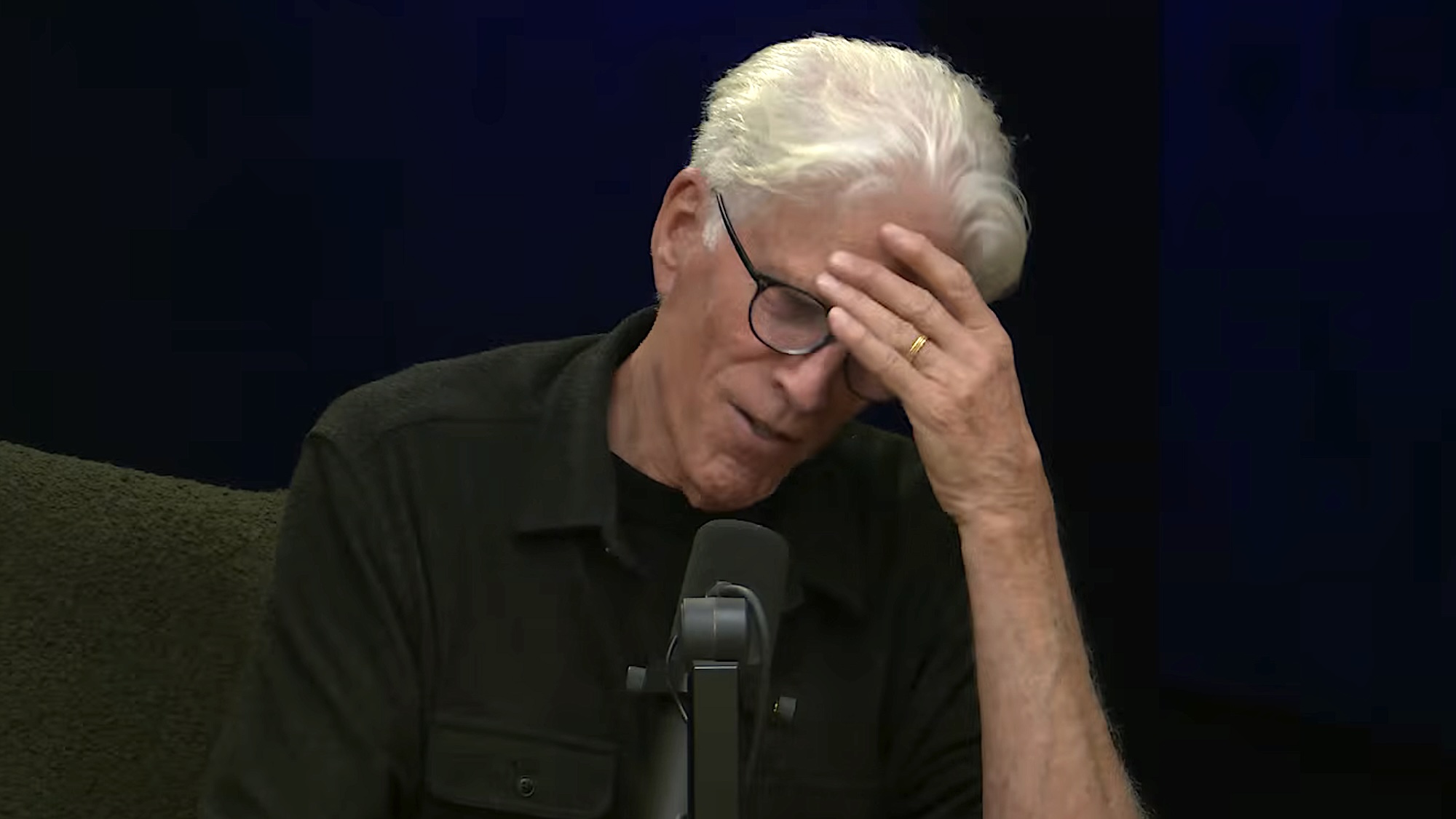 Ted Danson sheepishly putting head on his hand talking to Katey Sagal on Where Everybody Knows Your Name