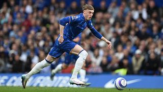 Cole Palmer of Chelsea runs with the ball during the Premier League match between Chelsea FC and Ipswich Town FC at Stamford Bridge on April 13, 2025 in London, England.