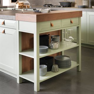 kitchen island unit with green butchers block and island