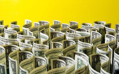 Closeup Of Fifty Dollar Bills On Wooden Table. Fifty Dollar Stock