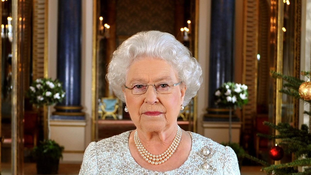 LONDON, UNITED KINGDOM - DECEMBER 07: Queen Elizabeth II records her Christmas message to the Commonwealth, in 3D for the first time, in the White Drawing Room at Buckingham Palace on December 7, 2012 in London England. Broadcast on December 25, 2012, the Queen paid tribute in her Christmas speech to Great Britain&#039;s Olympic and Paralympic athletes for inspiring the nation during a &quot;splendid summer of sport&quot;. (Photo by John Stillwell - WPA Pool/Getty Images)